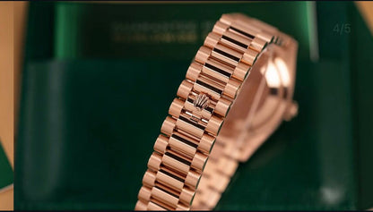 Rolex Oyster Perpetual Everose gold with an olive green dial.