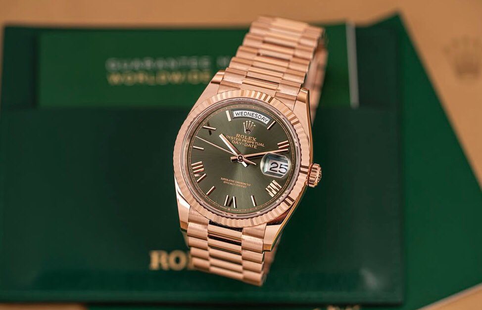 Rolex Oyster Perpetual Everose gold with an olive green dial.