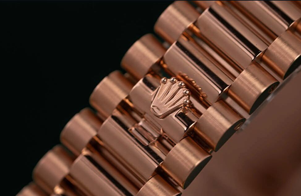 Rolex Oyster Perpetual Everose gold with an olive green dial.