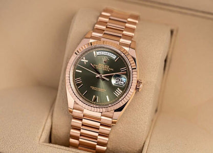 Rolex Oyster Perpetual Everose gold with an olive green dial.
