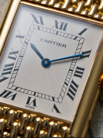 Cartier Tank Louis watch with an 18K yellow gold "Milanese" bracelet, available