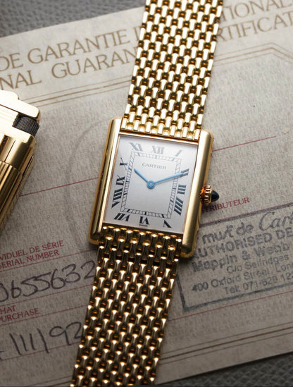 Cartier Tank Louis watch with an 18K yellow gold "Milanese" bracelet, available