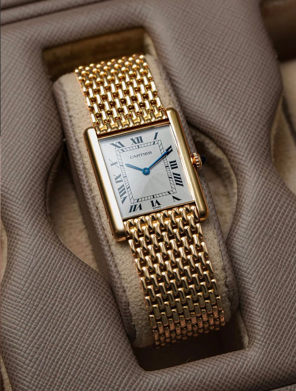Cartier Tank Louis watch with an 18K yellow gold "Milanese" bracelet, available