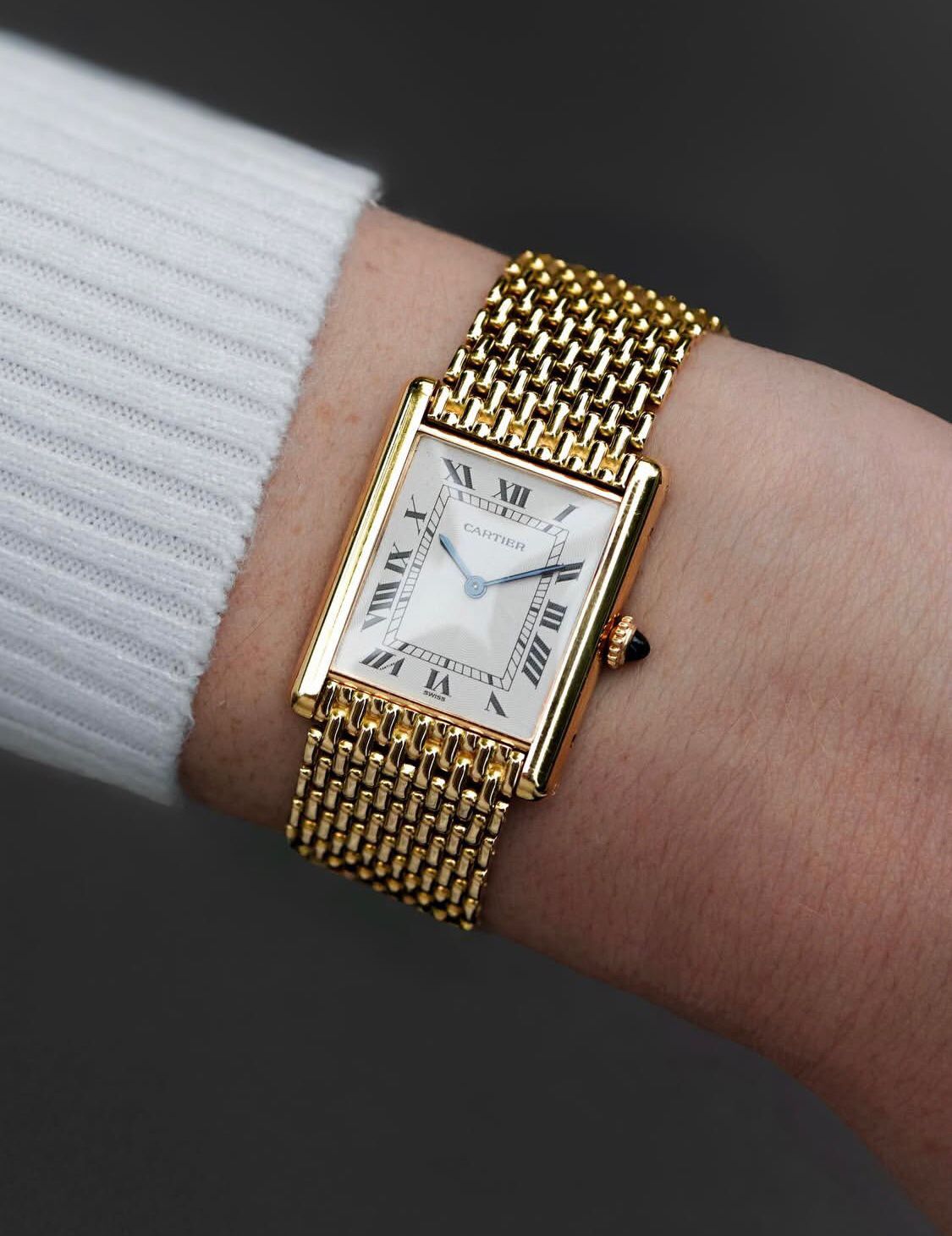 Cartier Tank Louis watch with an 18K yellow gold "Milanese" bracelet, available