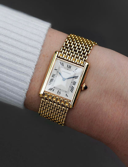 Cartier Tank Louis watch with an 18K yellow gold "Milanese" bracelet, available