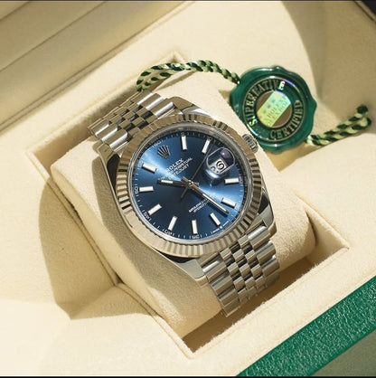 Rolex Datejust Reference 126334; featuring a stunning blue dial, classic fluted bezel, and jubilee bracelet. 💙