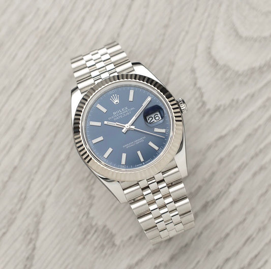 Rolex Datejust Reference 126334; featuring a stunning blue dial, classic fluted bezel, and jubilee bracelet. 💙